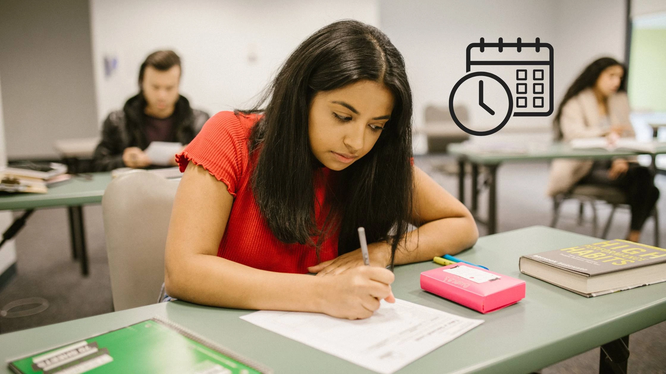 in this post a student is sitting on a desk and writing something which shows time management